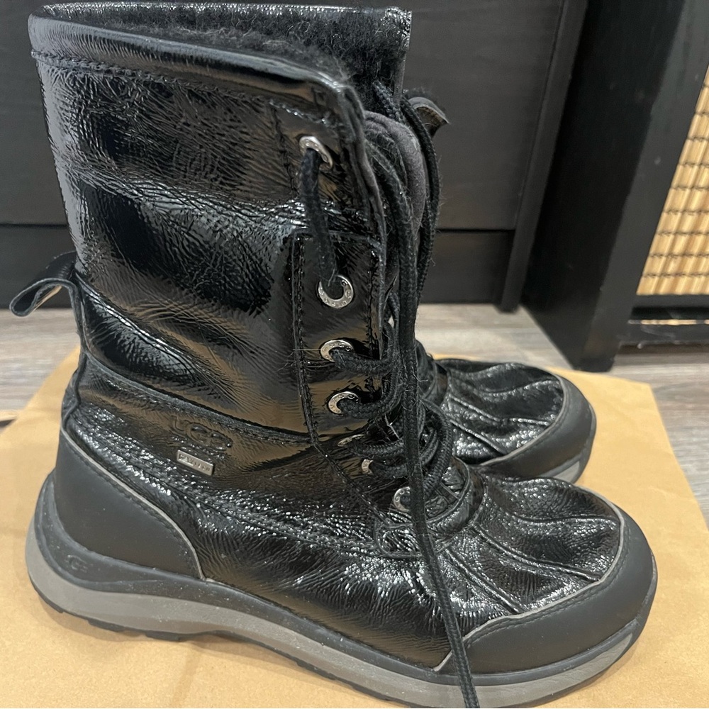 UGG Black Winter Boots with Lace-Up Design and Insulation